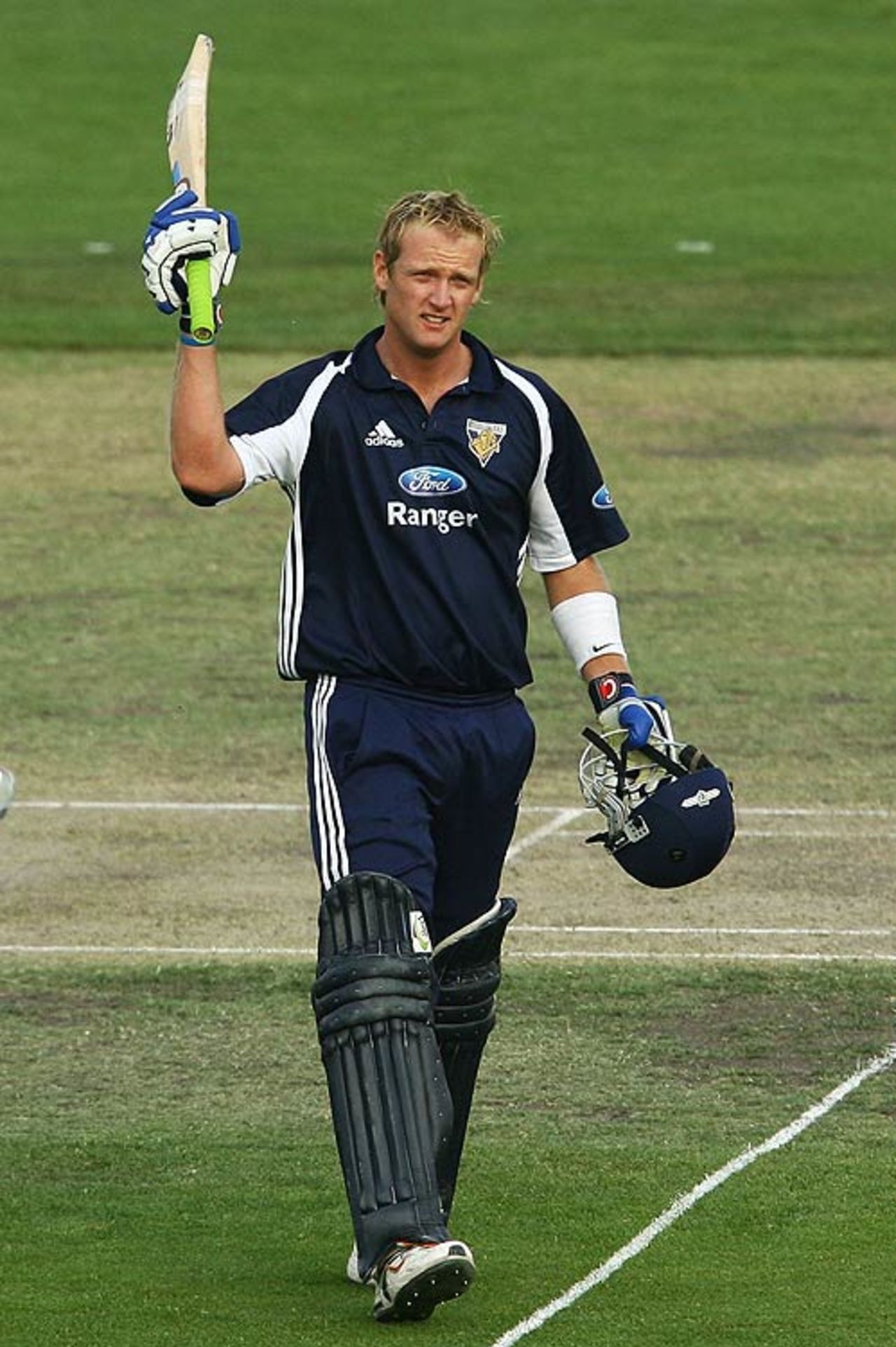 Cameron White raises his bat after reaching his century, New South Wales v Victoria, Ford Ranger Cup, Canberra, December 10, 2006