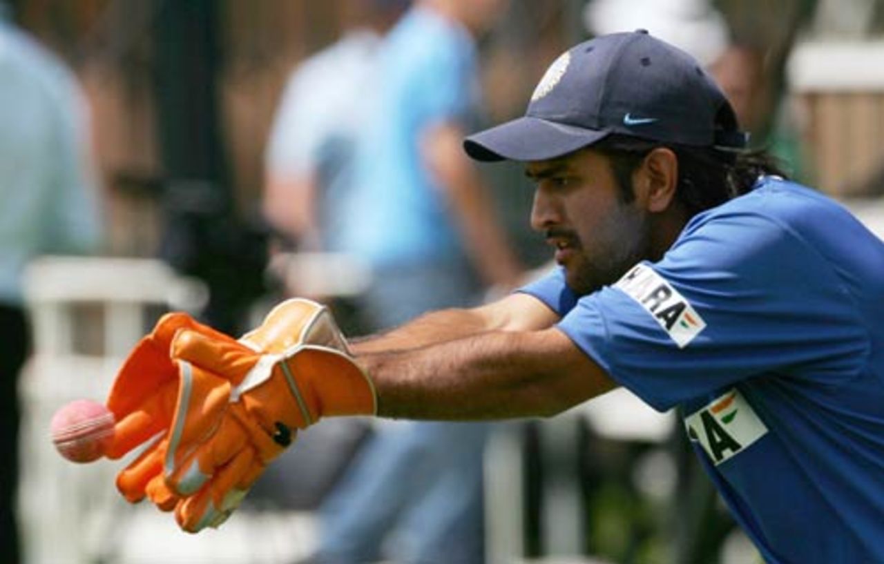 Mahendra Singh Dhoni keeps his eyes on the ball in the nets ahead of the first Test, Johannesburg, December 12, 2006