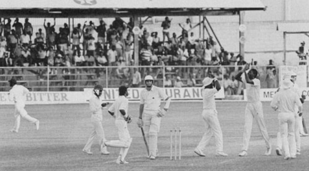 A bewildered Rob Bailey turns for the pavilion after being given out caught behind. At the extreme left is Viv Richards at the end of his manic, arm-waving appeal, West Indies v England, 4th Test, Barbados, April 8, 1990