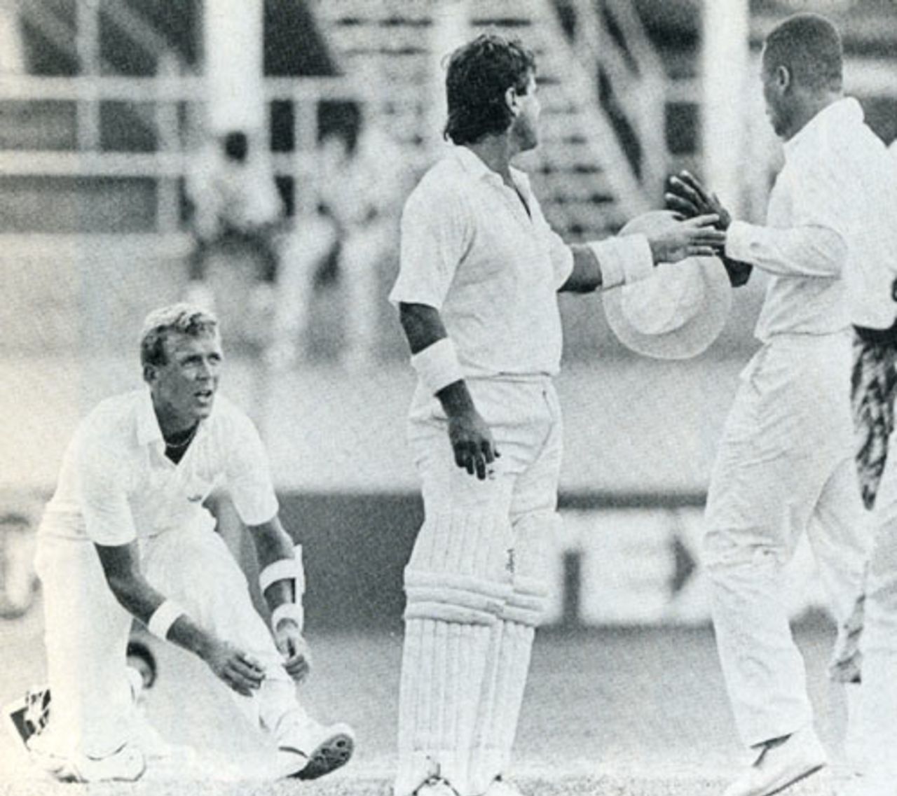 Allan Lamb steps between a rowing Alec Stewart and Desmond Haynes. Stewart was incensed by Haynes' blatant time wasting, West Indies v England, 3rd Test, Trinidad, March 28, 1990