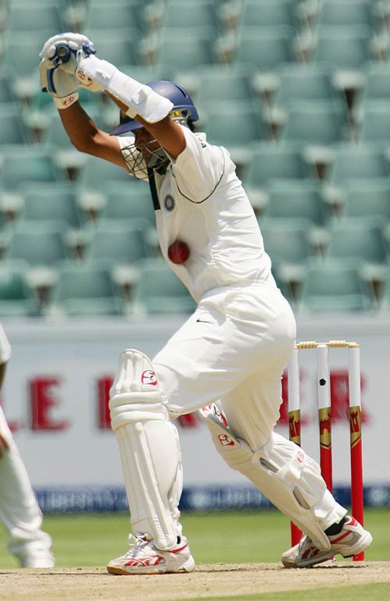 Rahul Dravid received a painful blow on the ribs after a Pollock delivery lifted from a good length, South Africa v India, 1st Test, Johannesburg, 1st day, December 15, 2006