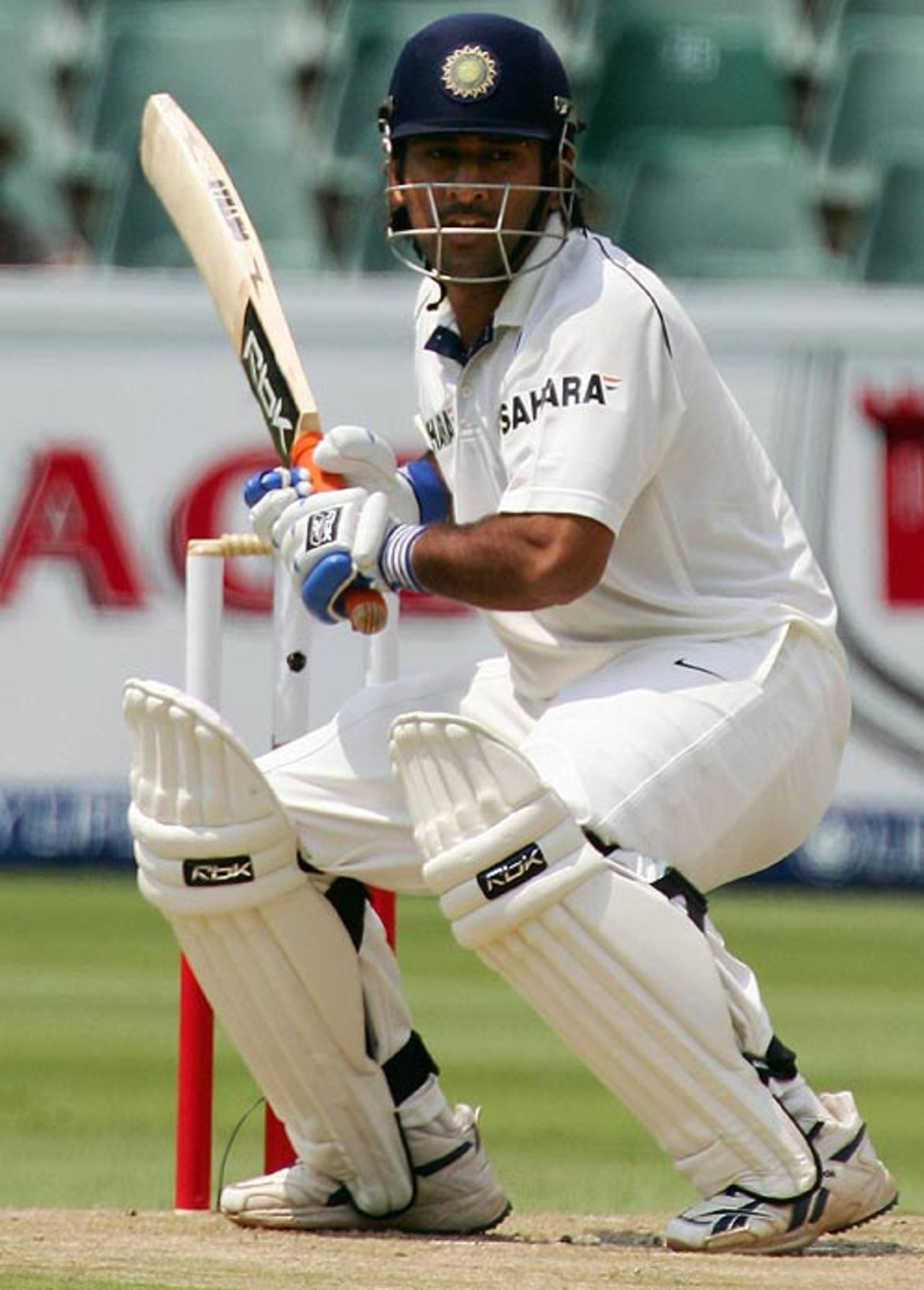 Mahendra Singh Dhoni tries an unconventional stroke, South Africa v India, 1st Test, Johannesburg, 2nd day, December 16, 2006