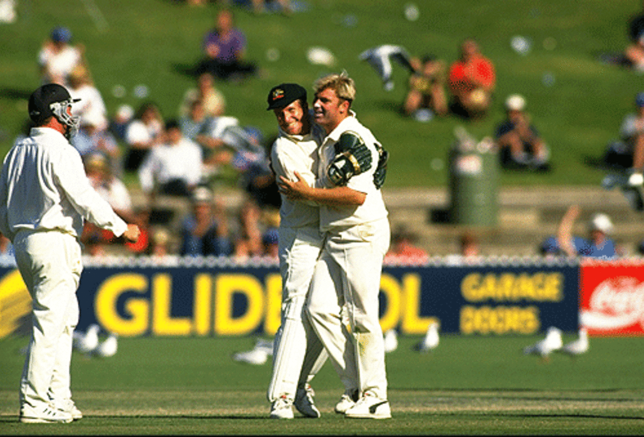Ian Healy congratulates Shane Warne on his 100th Test wicket, Australia v South Africa, 3rd Test, Adelaide, January 28, 1994 