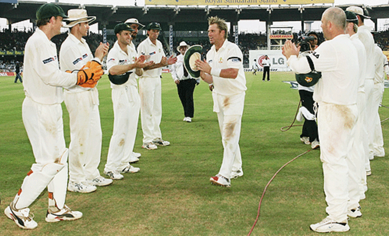 Shane Warne is clapped off the field after becoming the world's leading wicket-taker, India v Australia, 2nd Test, Chennai, October 15, 2004