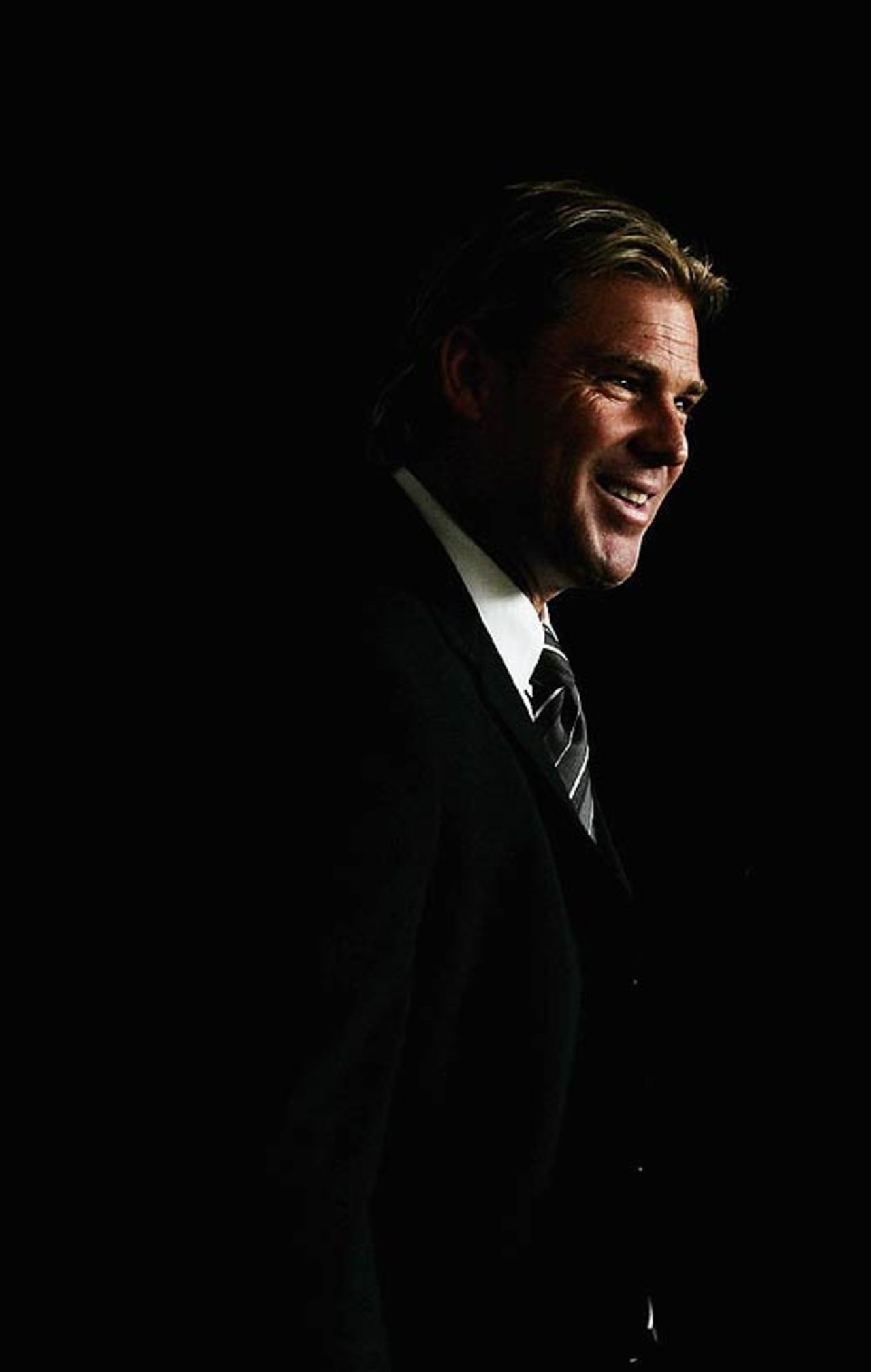 Shane Warne arrives at the MCG press conference to announce his retirement, Melbourne, December 21, 2006