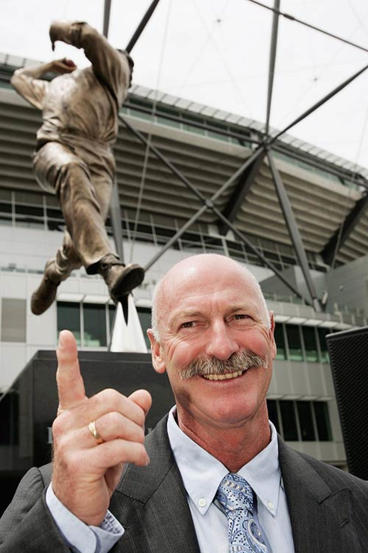Dennis Lillee unveils a statue of himself as part of the Walk of the Champions at the Melbourne Cricket Ground, Melbourne, December 22, 2006