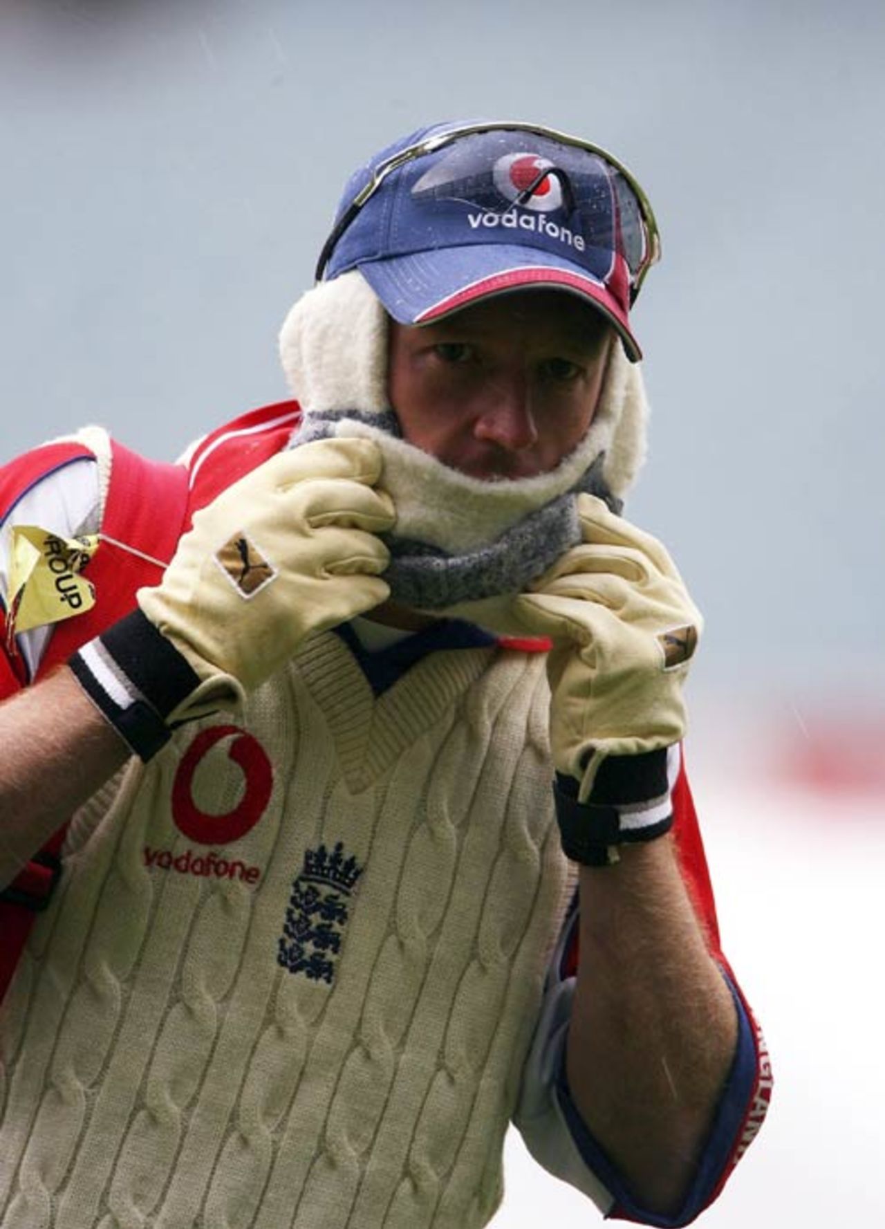 Paul Collingwood keeps warm with socks on his ears during the nets session, Melbourne, December 25, 2006