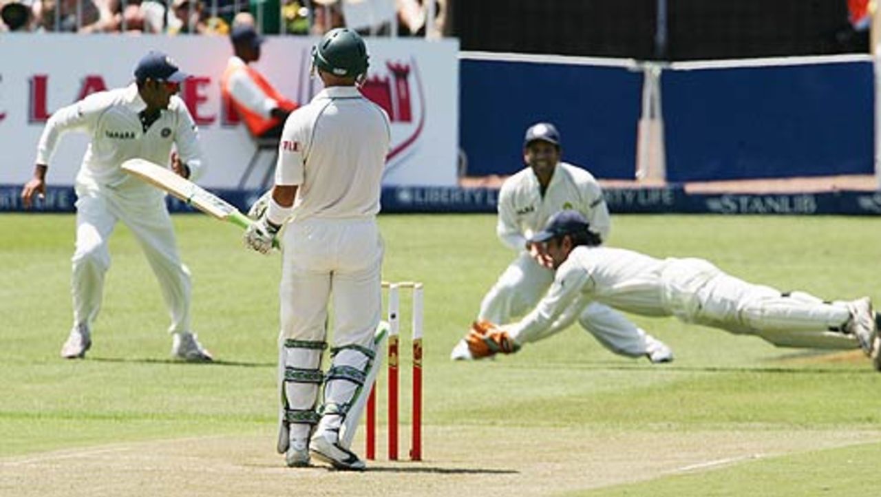 Mahendra Singh Dhoni dives to catch Herschelle Gibbs, South Africa v India, 2nd Test, Durban, 1st day, December 26, 2006