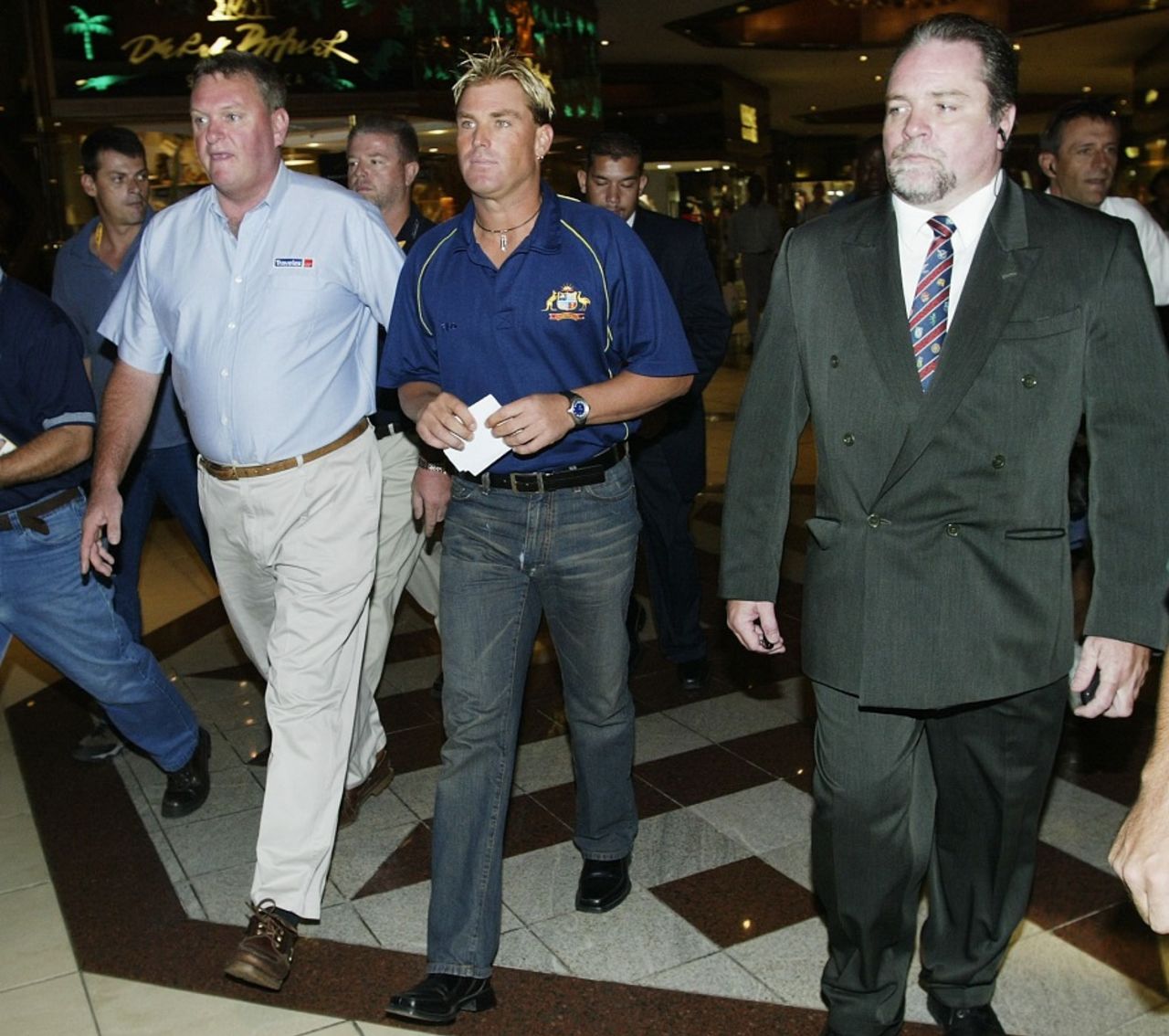 Shane Warne arrives to front the media to read a statement announcing he has tested positive to a banned substance, Johannesburg, February 11, 2003