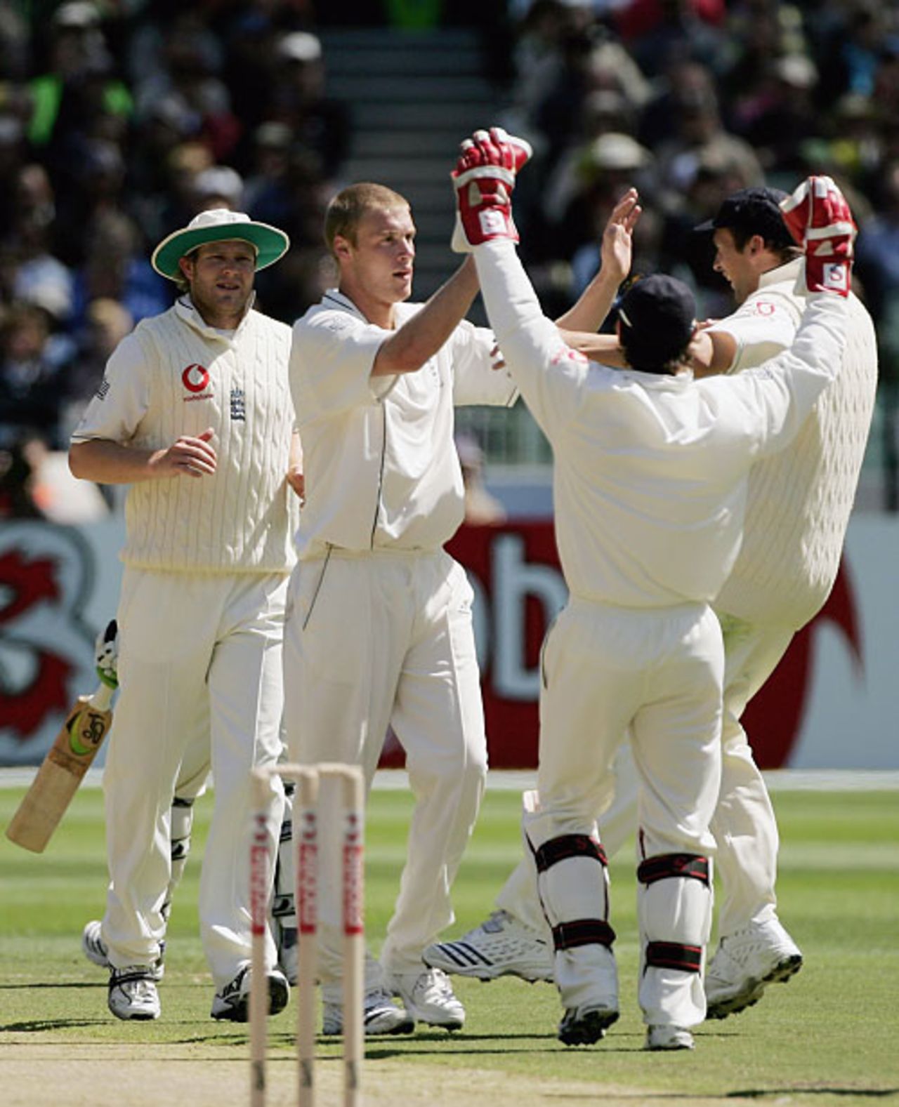 A determined Andrew Flintoff is congratulated on dismissing Ricky Ponting, Australia v England, 4th Test, Melbourne, December 27, 2006
