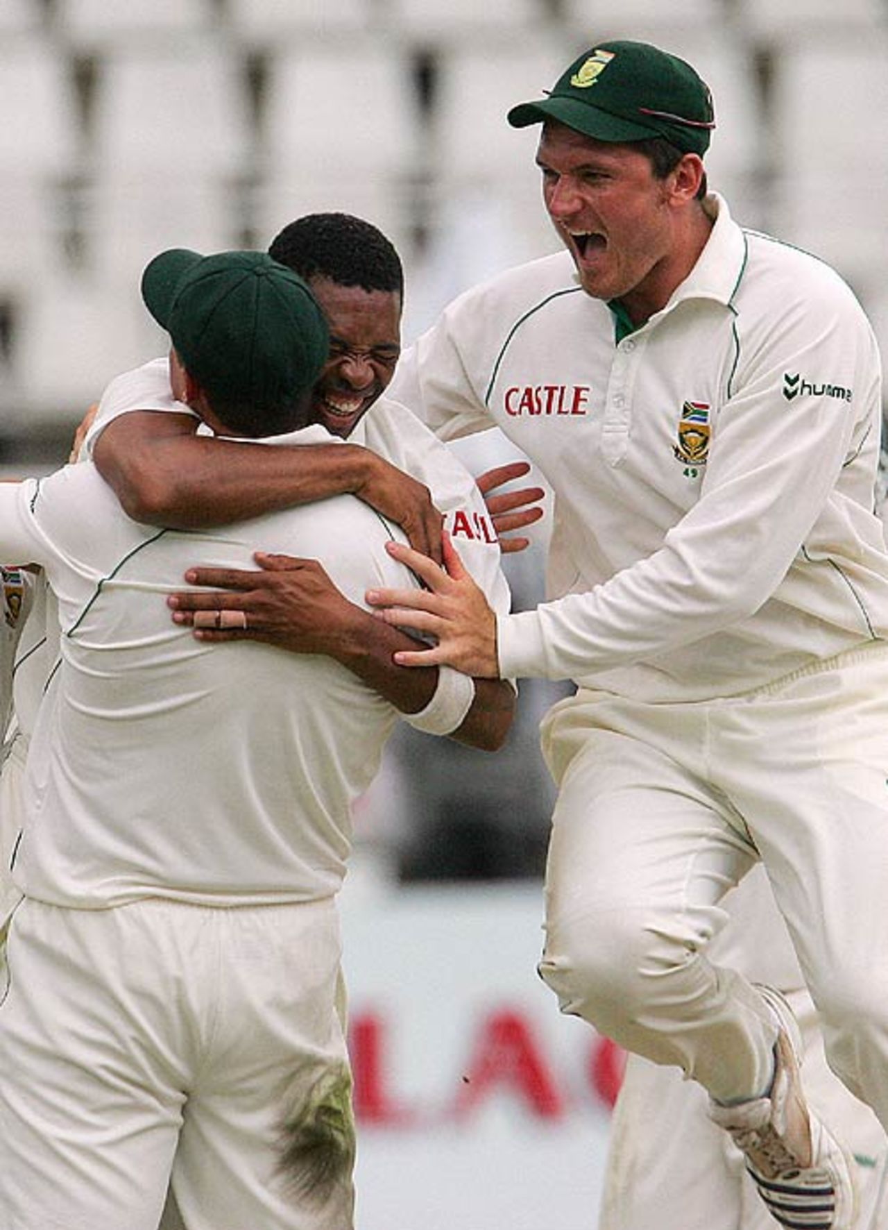 Makhaya Ntini is mobbed by his team-mates after dismissing Wasim Jaffer, South Africa v India, 2nd Test, Durban, 5th day, December 30, 2006