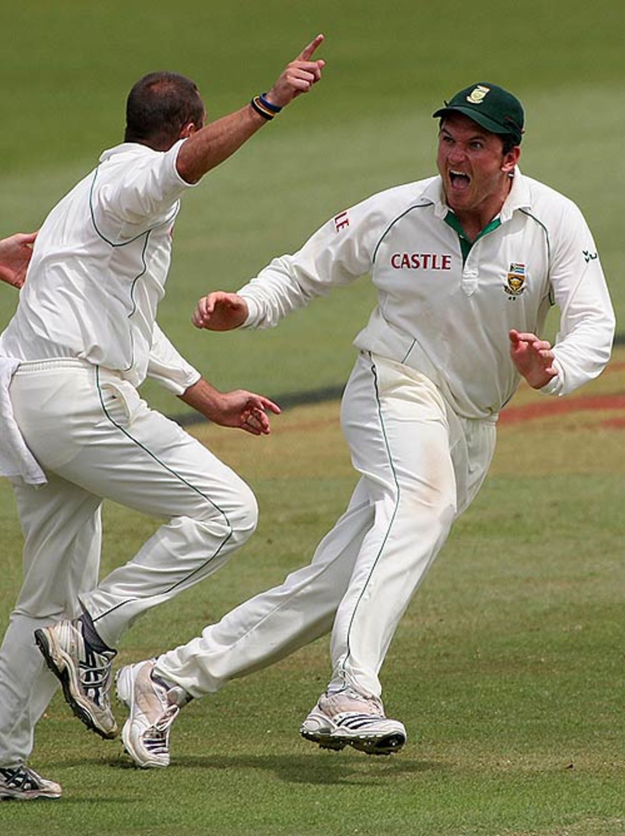 Graeme Smith and Andrew Hall are ecstatic after the dismissal of Anil Kumble, South Africa v India, 2nd Test, Durban, 5th day, December 30, 2006