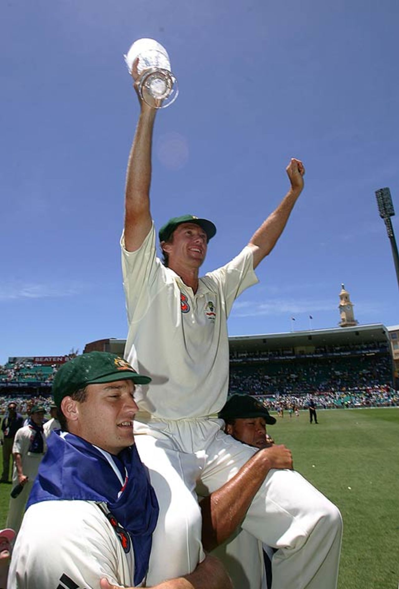 Glenn McGrath is chaired off the SCG after his final Test by Stuart Clark and Andrew Symonds, Australia v England, 5th Test, Sydney, January 5, 2007