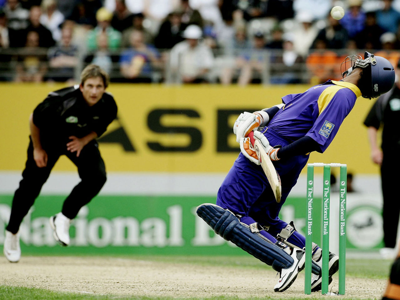Kumar Sangakkara sways to avoid a bouncer from Shane Bond, New Zealand v Sri Lanka, 4th ODI, Eden Park, January 6, 2007