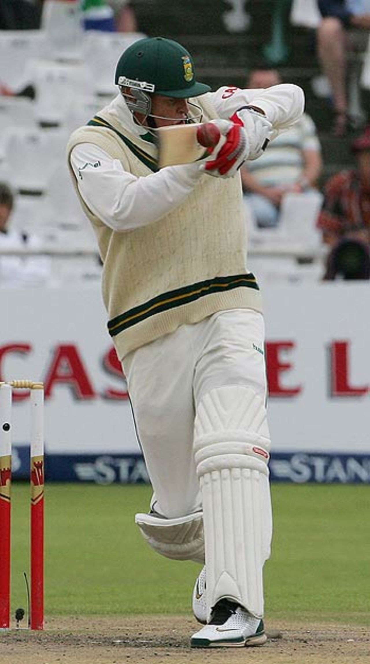 Shaun Pollock gets on top of a rising delivery, South Africa v India, 3rd Test, Cape Town, 5th day, January 6, 2007