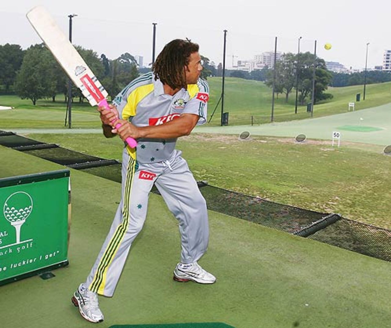 Andrew Symonds tees off with a cricket bat at Moore Park Driving Range as part of a Twenty20 promotion, Sydney, January 8, 2007