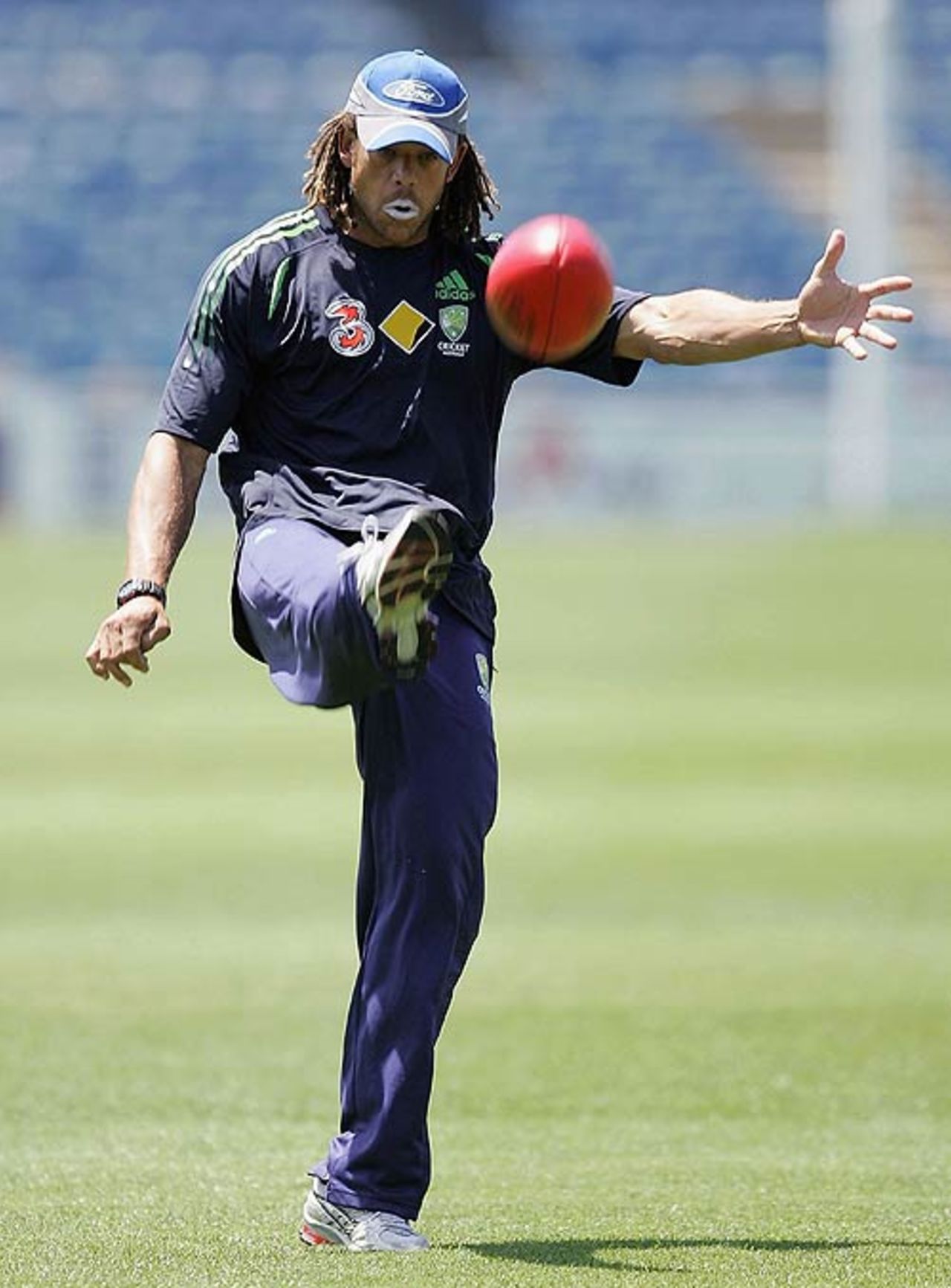 Andrew Symonds warms up with some Australian rules football, Geelong, January 10, 2007