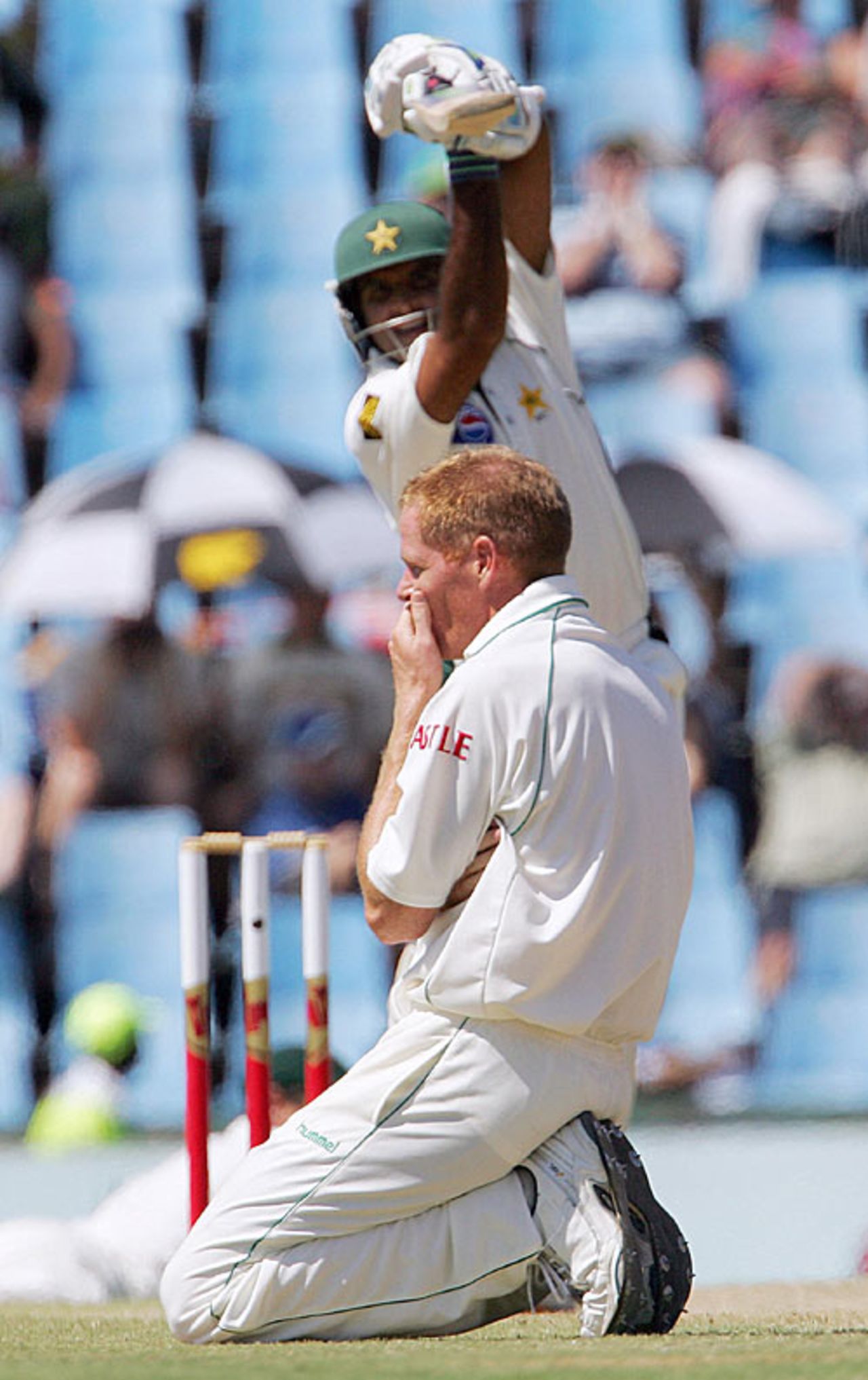 Shaun Pollock is floored after Rana Naved smacks him for another four, South Africa v Pakistan, 1st Test, Centurion Park, January 14, 2007