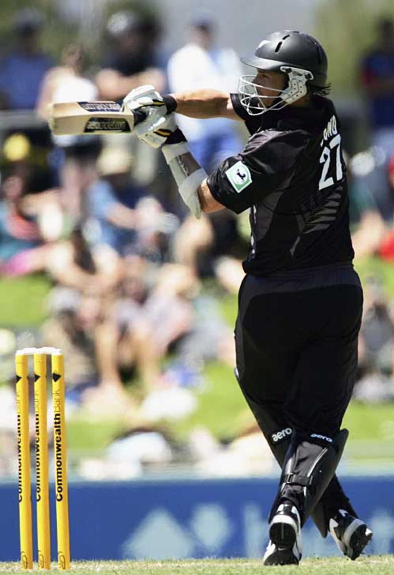 Shane Bond swings hard during his unbeaten 22, England v New Zealand, CB Series, 3rd match, Hobart, January 16, 2007