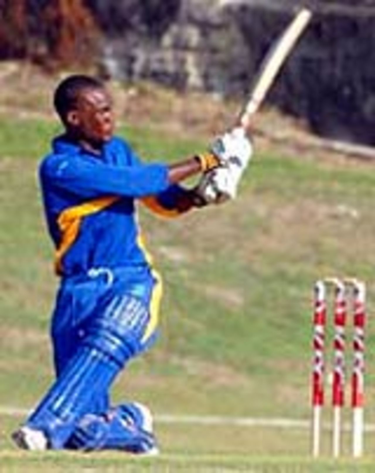 Kevin Stoute sweeps en route to his 73, Barbados v Leeward Islands, KFC Cup, January 17, 2007