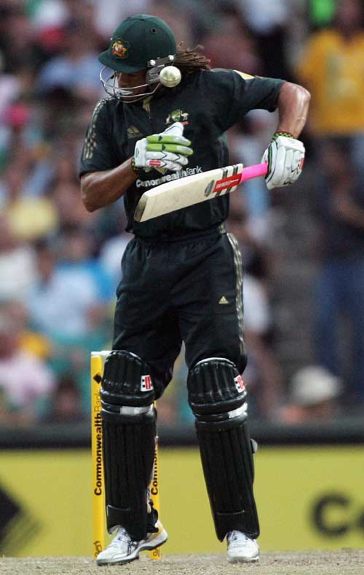 Andrew Symonds takes a short ball on the helmet, Australia v New Zealand, CB Series, 5th match, Sydney, January 21, 2007