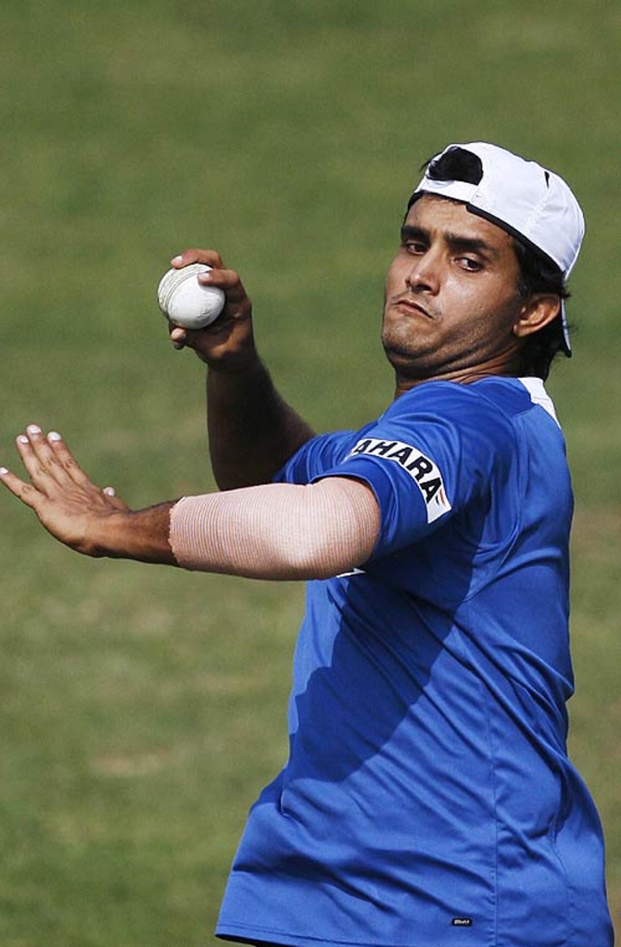 Sourav Ganguly runs into bowl in the nets ahead of the second one-dayer, Cuttack, January 23, 2007