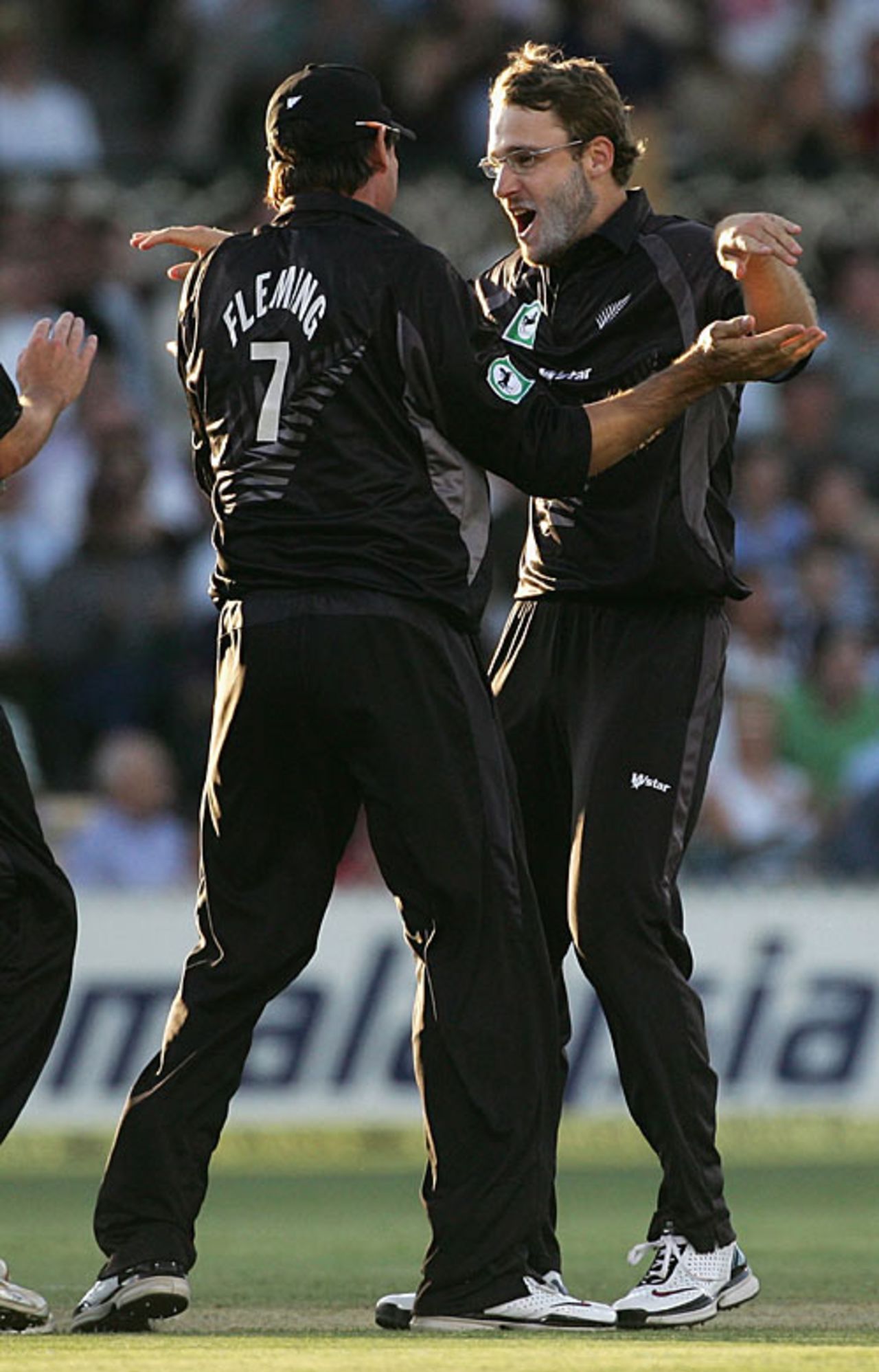 Stephen Fleming congratulates Daniel Vettori on the wicket of Paul Collingwood, England v New Zealand, CB Series, Adelaide, January 23, 2007