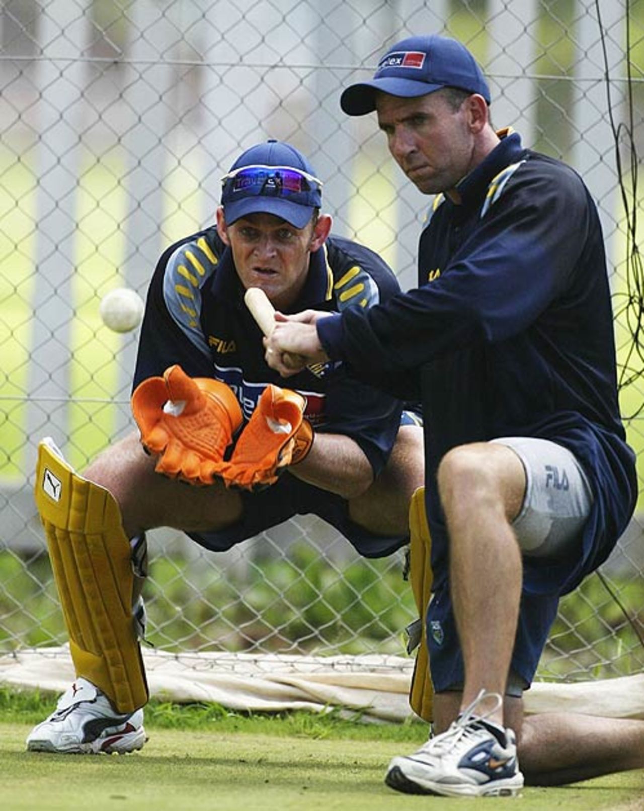 Tim Nielsen gives Adam Gilchrist some catching practice, Potchefstroom, February 22, 2003