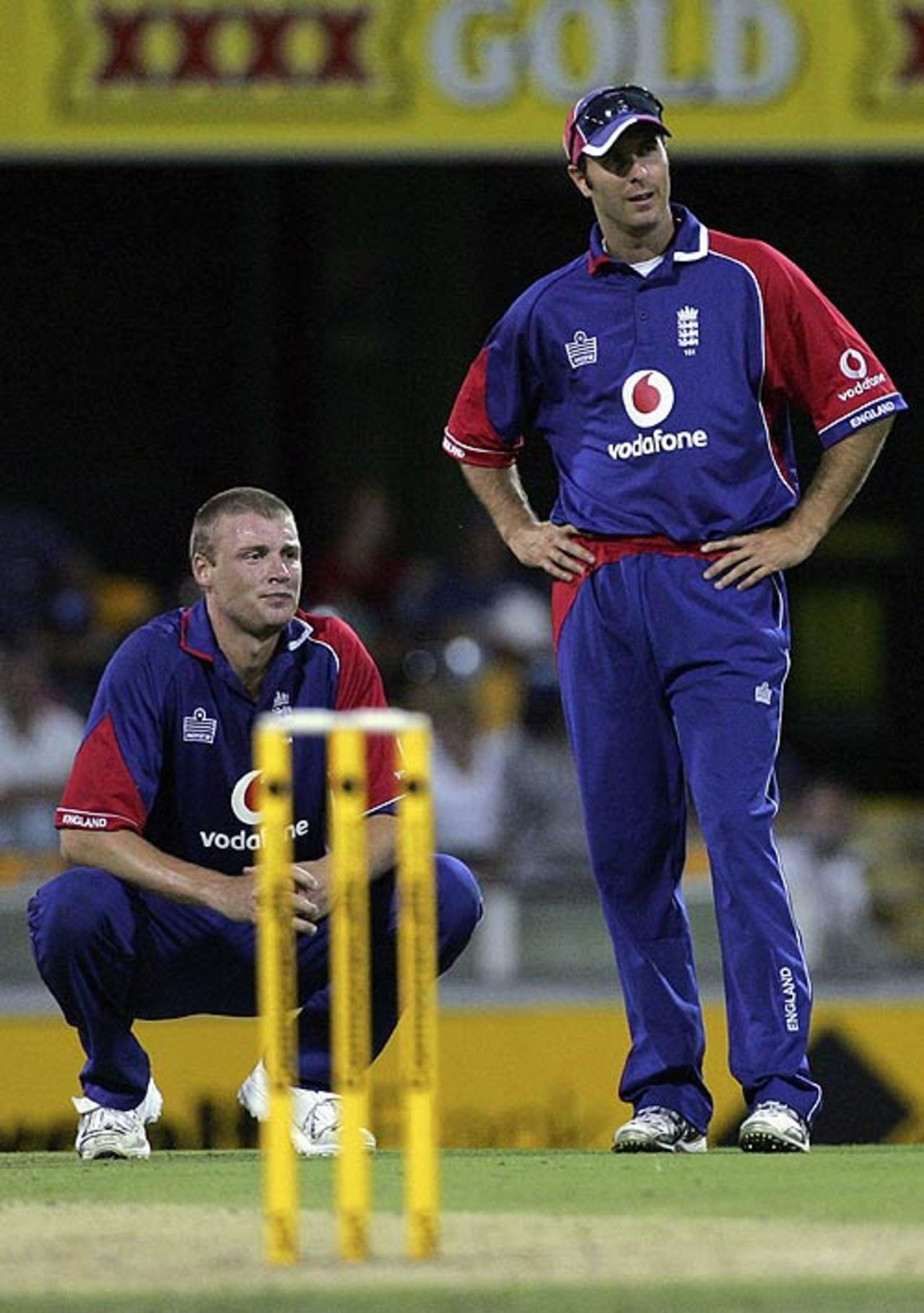 Michael Vaughan and Andrew Flintoff discuss options as England toil in the early stages of New Zealand's innings, England v New Zealand, CB Series, 12th match, Brisbane, February 6, 2007