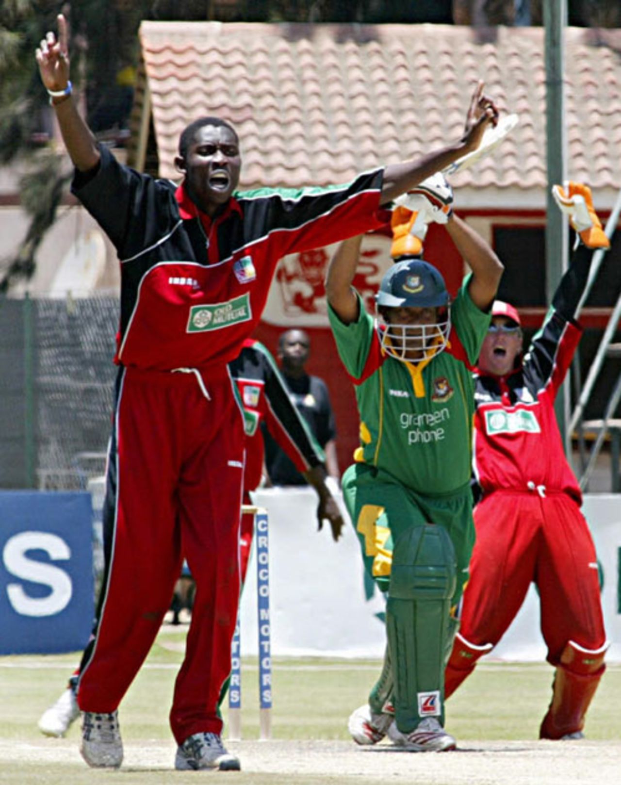 Christopher Mpofu and Brendan Taylor appeal for the wicket of Mohammad Rafique , Zimbabwe v Bangladesh, 2nd ODI, Harare, February 6, 2007