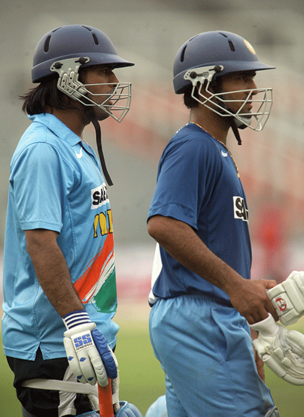Mahendra Singh Dhoni and Dinesh Karthik wait their turn at the nets, Eden Gardens, Kolkata, February 7, 2007