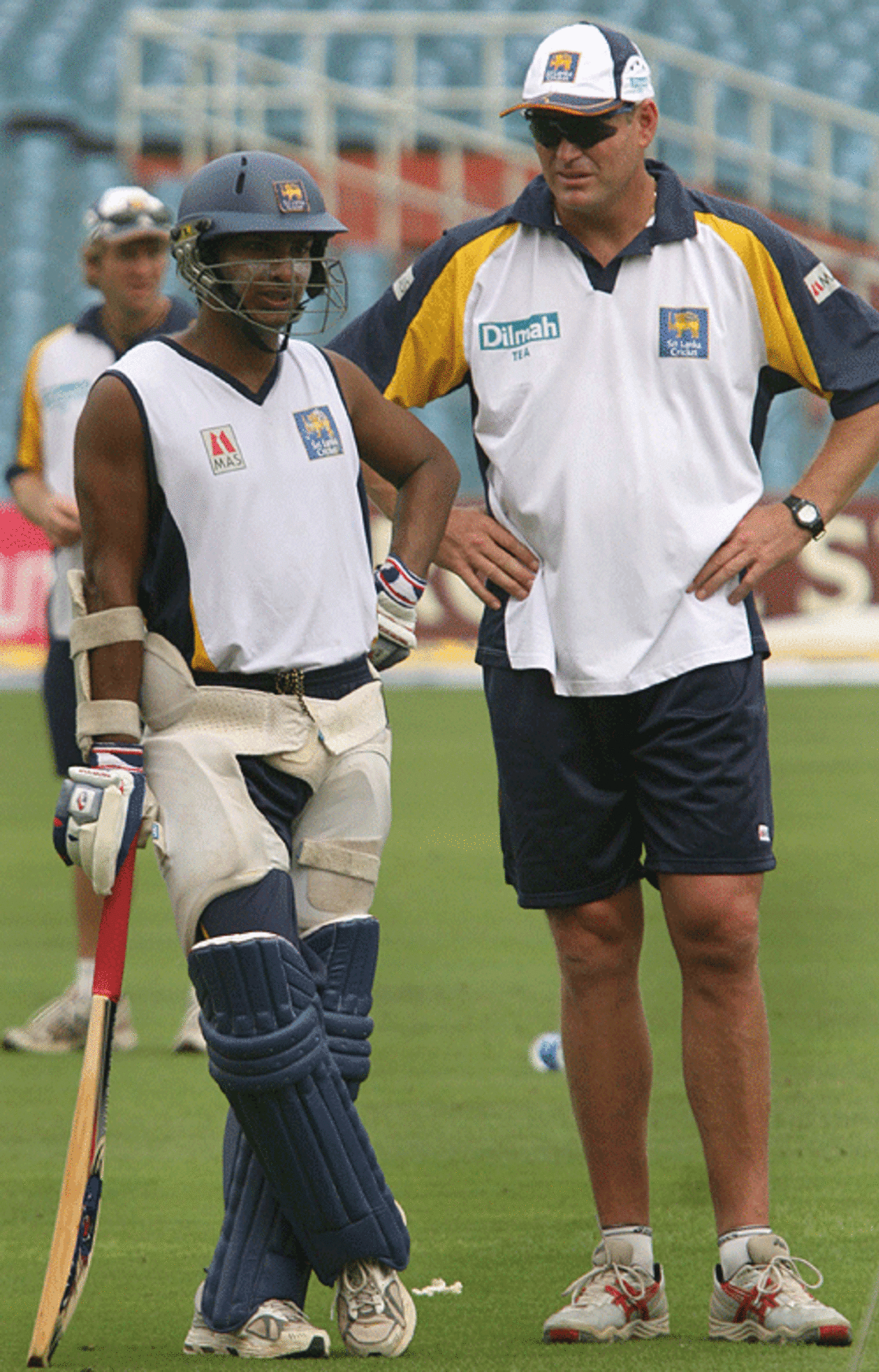 Kumar Sangakkara chats with Tom Moody ahead of his turn to bat, Eden Gardens, Kolkata, February 7, 2007