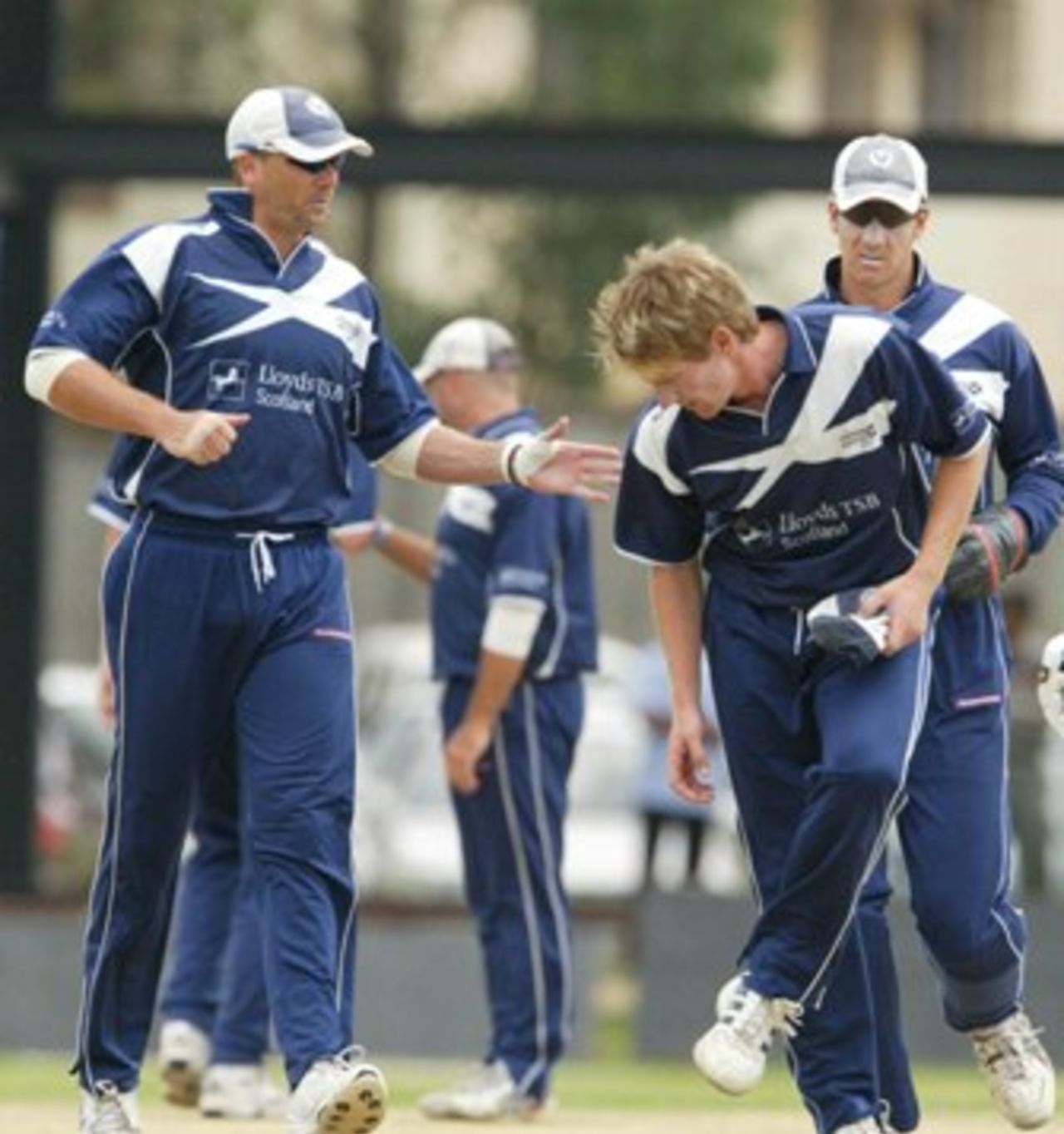 From left Scotland's Gavin Hamilton, fast bowler, John Blain and Wicketkeeper Colin Smith, during the Final of ICC World Cricket League Division 1 against Kenya, at the Nairobi Gymkhana Sports Club in Nairobi, Wednesday, Feb. 7, 2007.