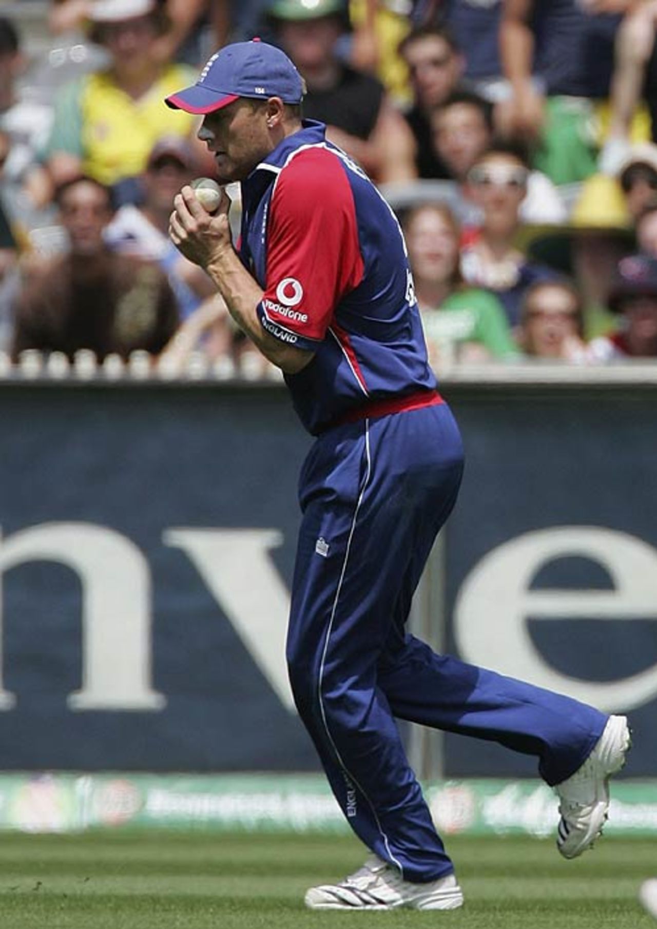 Andrew Flintoff just manages to cling onto a steepling chance from Adam Gilchrist, Australia v England, first CB Series final, Melbourne, February 9, 2007