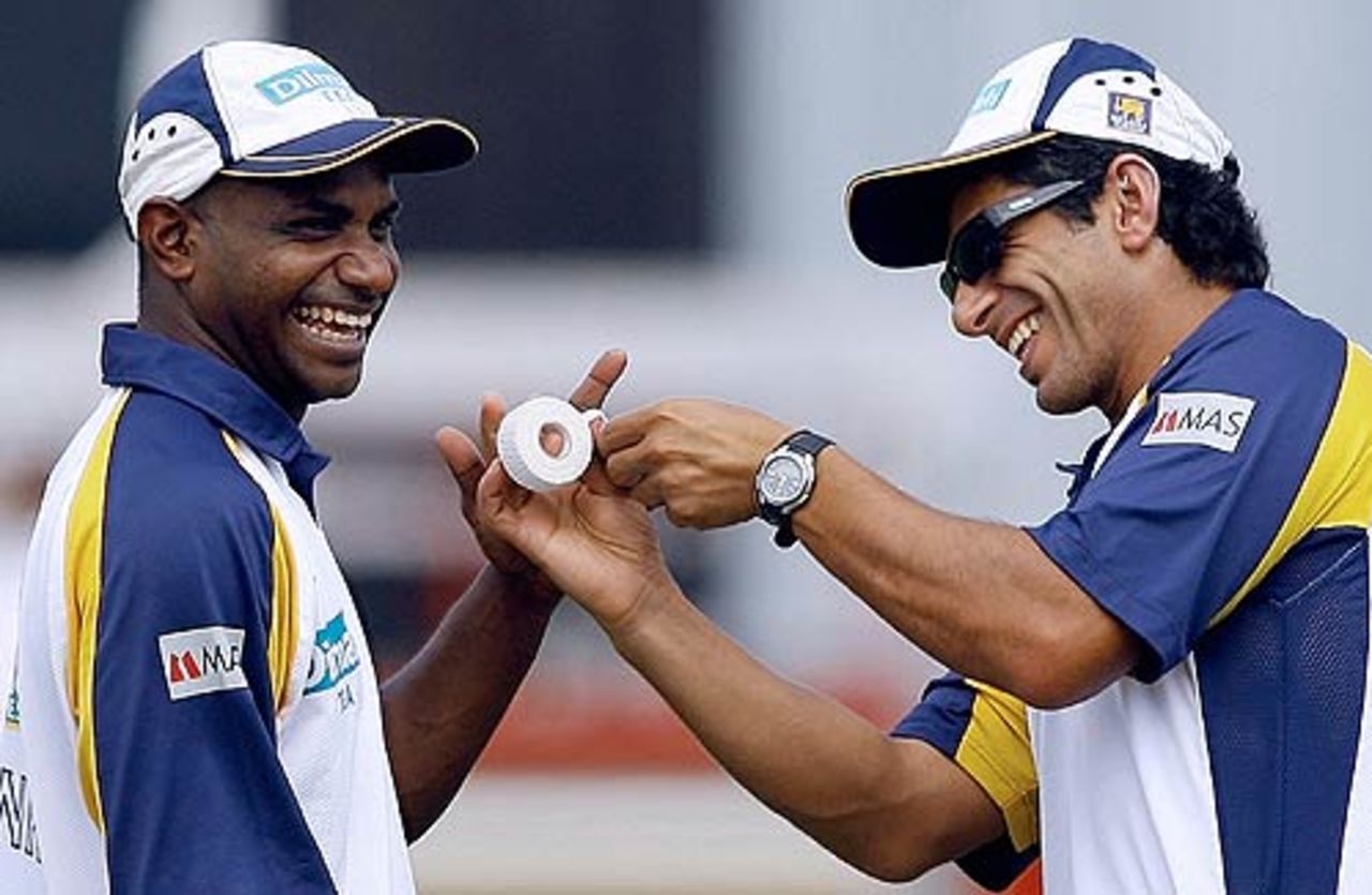 Sanath Jayasuriya and physio Tommy Simsek share a light moment   , Rajkot, February 10, 2007
