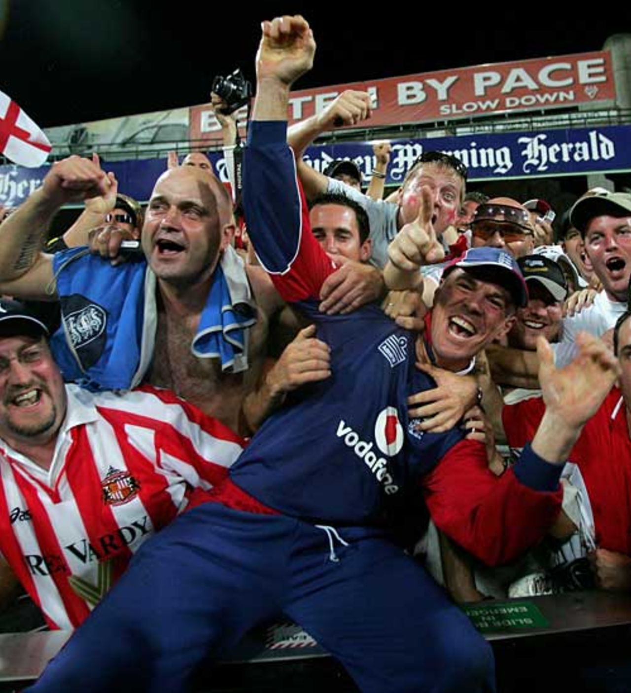 Paul Nixon dives into the Barmy Army as he savours England's victory, Australia v England, CB Series, 2nd final, Sydney, February 11, 2007