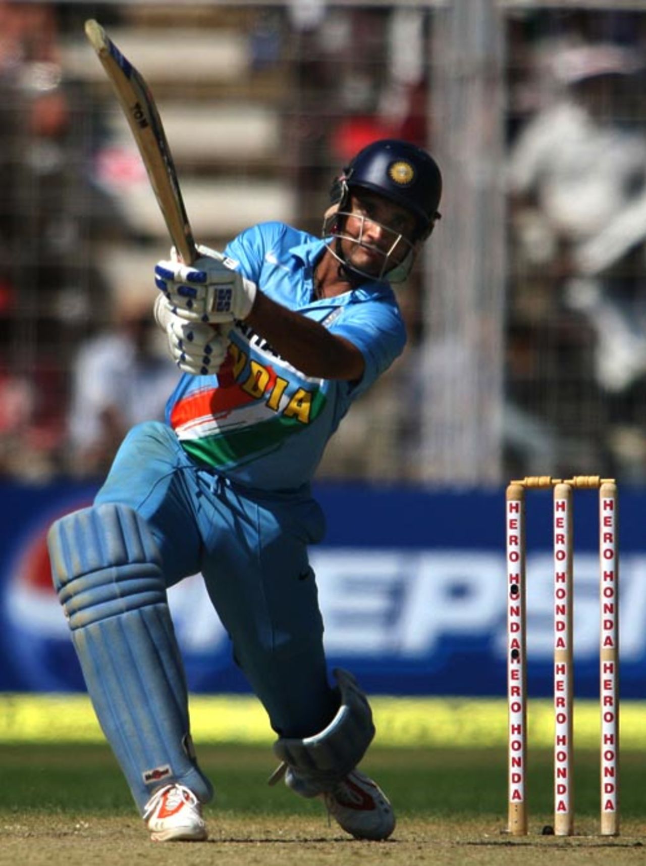 Saurav Ganguly steps out to drive Sanath Jayasuria for 4, India v Sri Lanka 3rd ODI, Margao, February 14, 2007