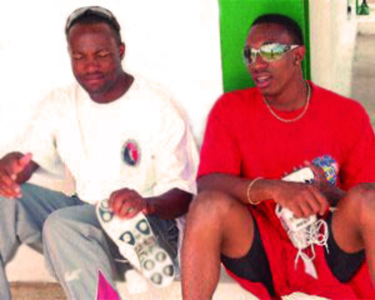 Brian Lara and Dwayne Bravo relax ahead of the Carib Beer Challenge final against Barbados, Gilbert Park, February 21, 2007