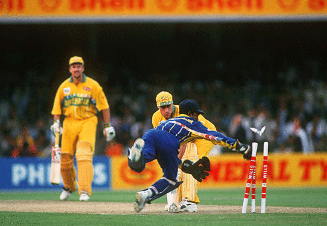 An acrobatic Romesh Kaluwitharana attempts to stump Michael Bevan, Final, Australia v Sri Lanka, Wills World Cup, Lahore, March 17, 1996