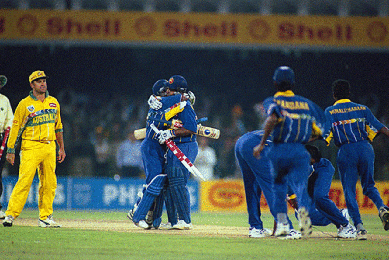 One team's glory, another's misery...Mark Taylor looks on as Sri Lanka celebrate victory, Final, Australia v Sri Lanka, Wills World Cup, Lahore, March 17, 1996