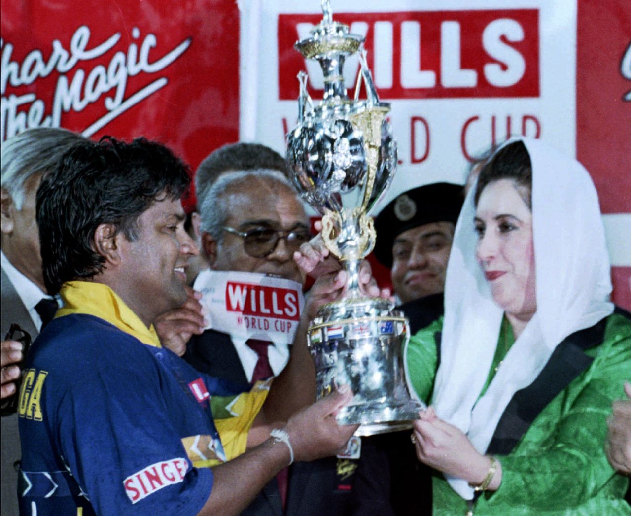Pakistan prime minister Benazir Bhutto hands over the World Cup trophy to Sri Lanka captain Arjuna Ranatunga, Australia v Sri Lanka, Final, Wills World Cup, Lahore, March 17, 1996