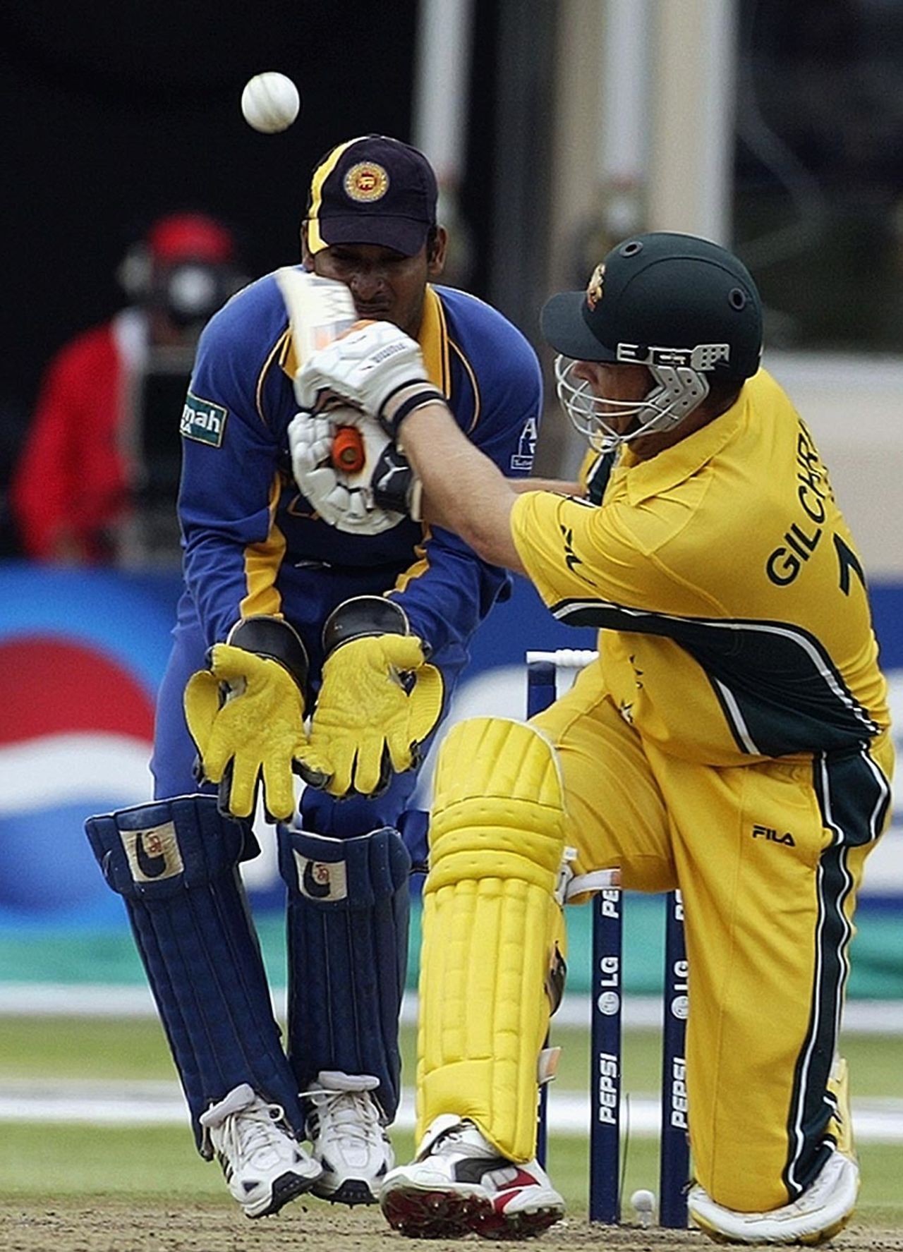 Adam Gilchrist edges off an attempted sweep, Australia v Sri Lanka, World Cup, 1st semi- final, Port Elizabeth, March 18, 2003