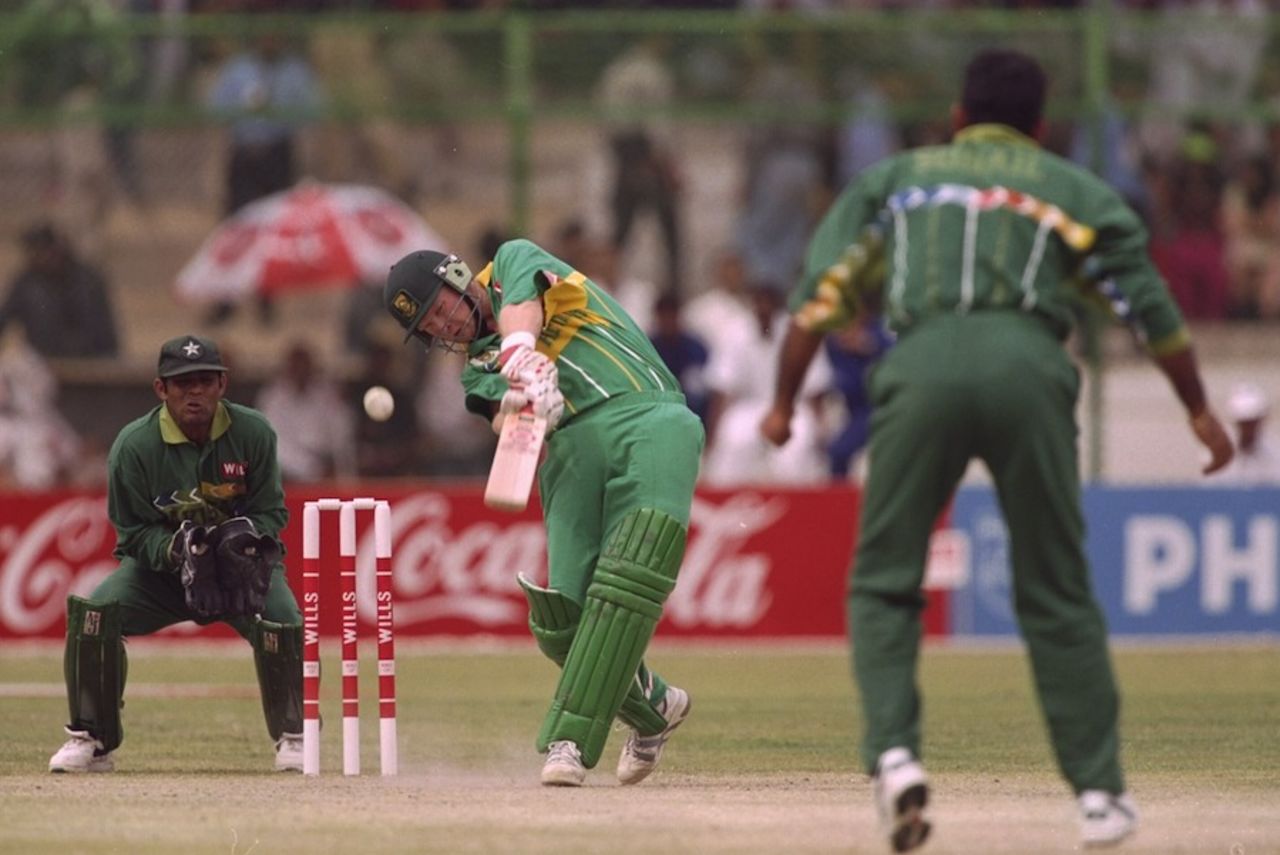 Daryll Cullinan hits Aamer Sohail over the top, Pakistan v South Africa, Karachi, February, 1996