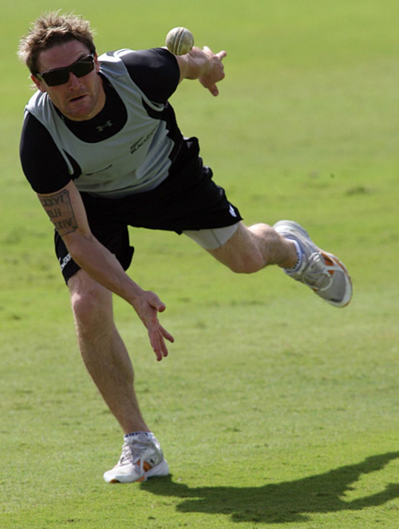 Brendon McCullum flings in a return during New Zealand's fielding session, 2007 World Cup, Kensington Oval, Barbados, March 5, 2007