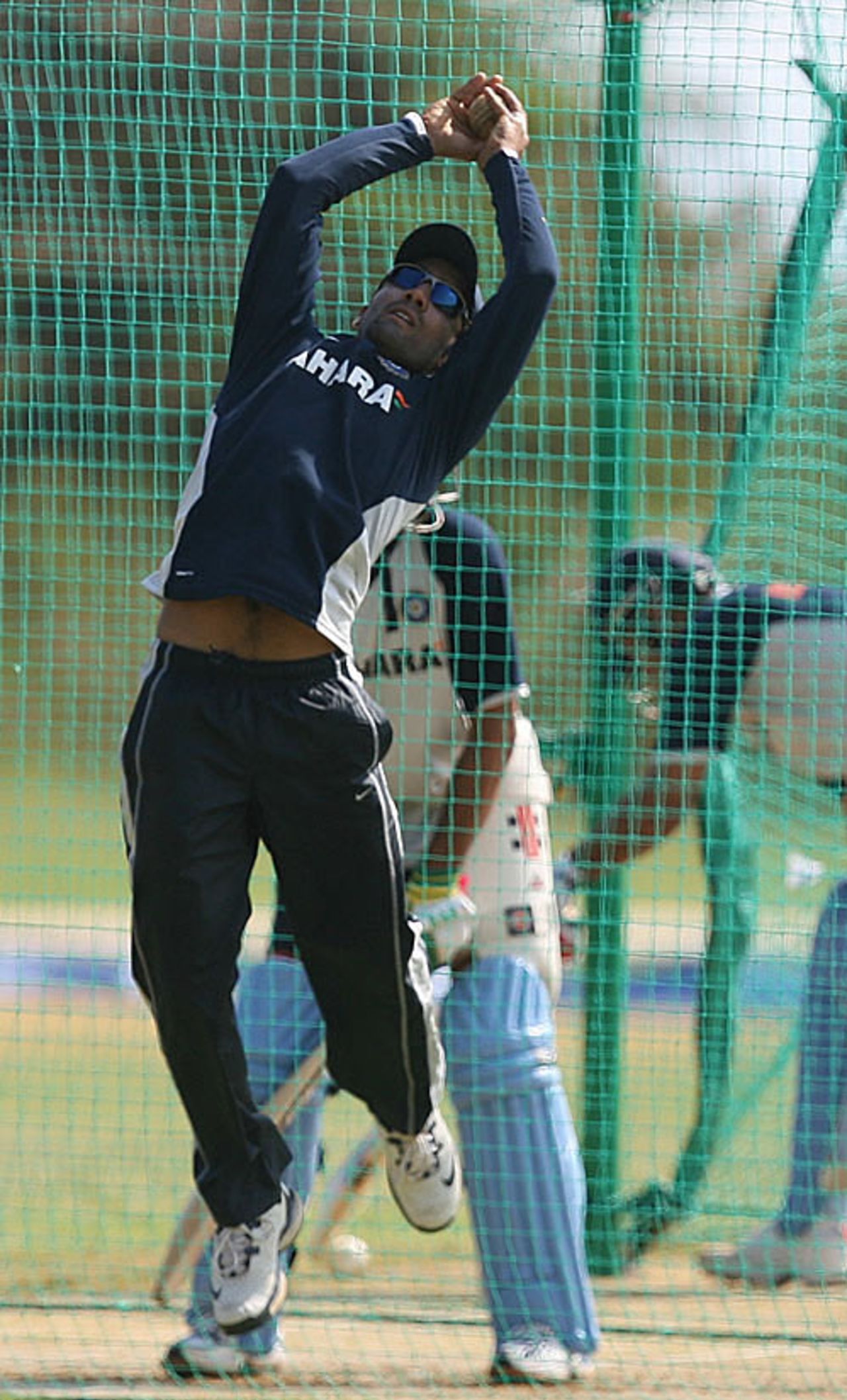 Dinesh Karthik leaps high during a training session, Montego Bay, March 5, 2007