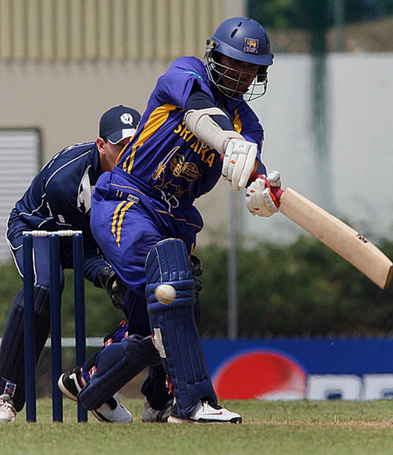 Kumar Sangakkara paddles one around the corner, Sri Lanka v Scotland, 3Ws Oval, Barbados, March 5, 2007