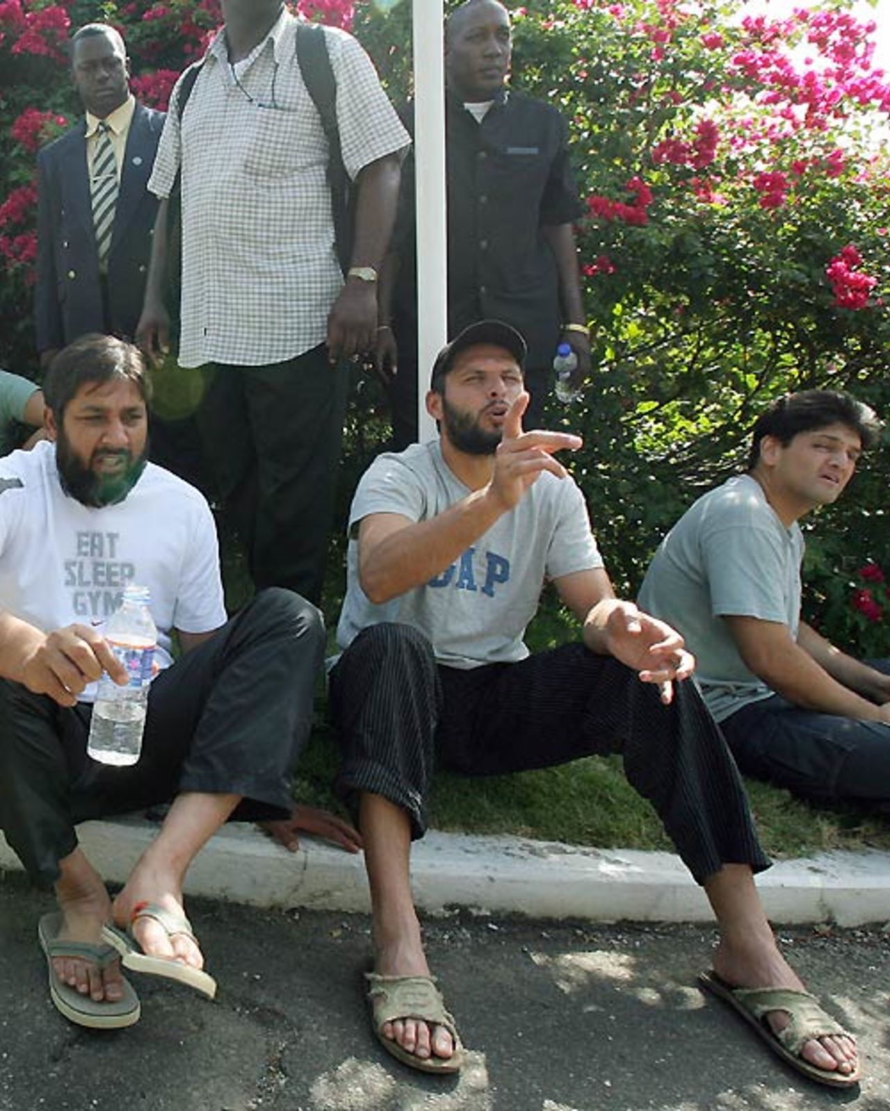 Inzamam and Shahid Afridi outside the hotel after a fire alarm scare, Port-of-Spain, March 7, 2007.