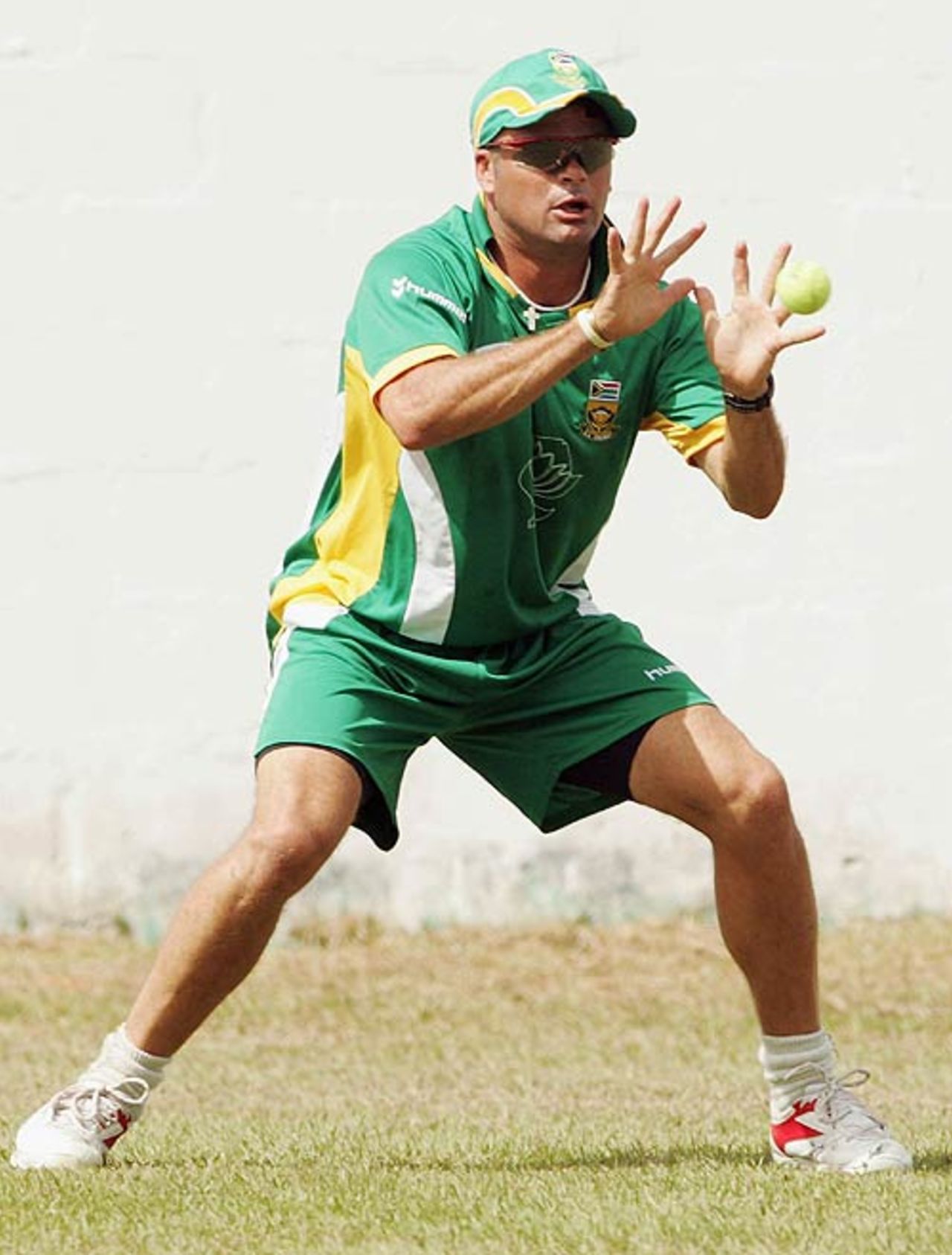 Charl Langeveldt fine-tunes his catching at St. Mary's College Ground, St Clair, Trinidad, March 7, 2007