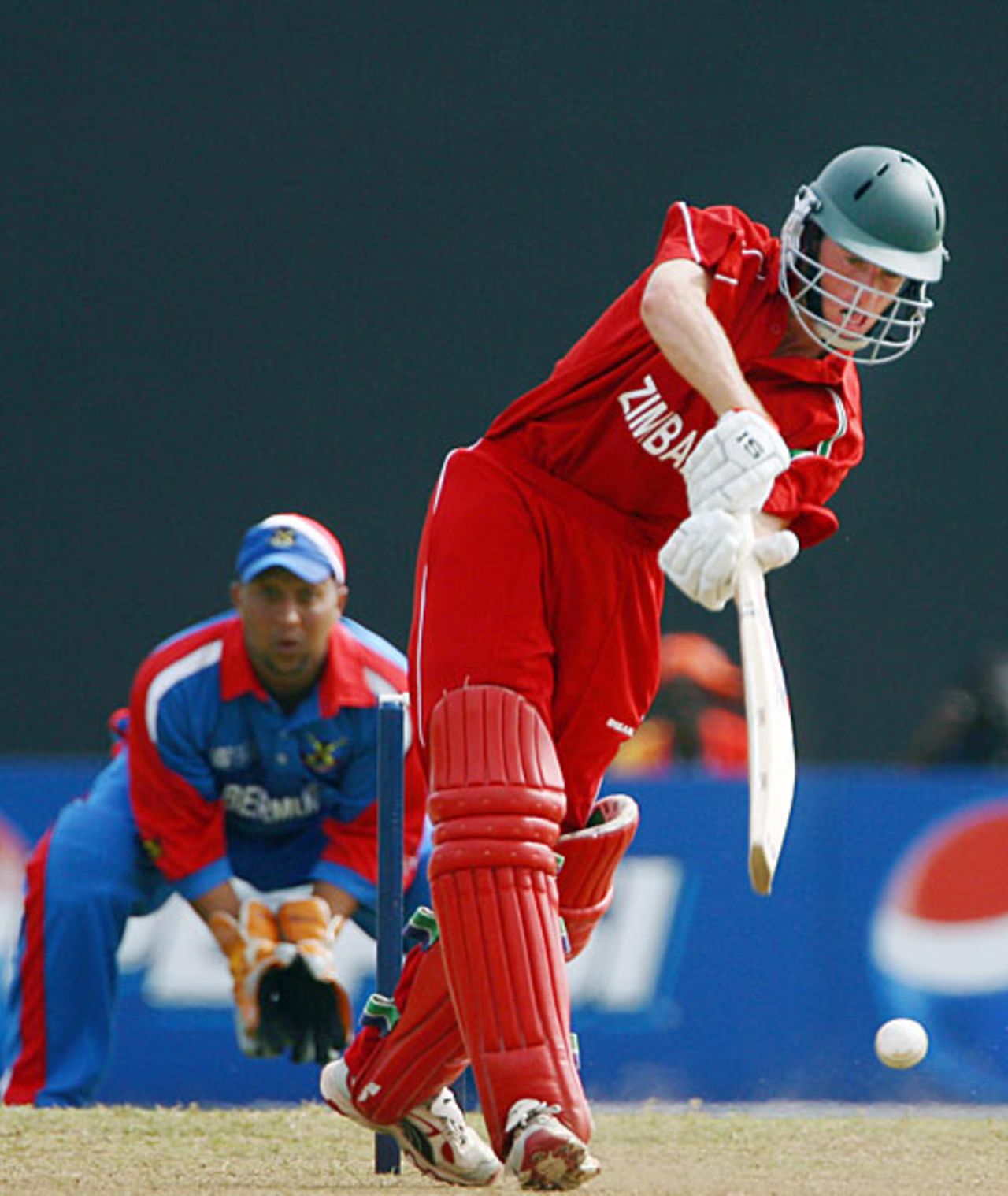 Sean Williams skips down the pitch to drive, Bermuda v Zimbabwe, 2007 World Cup warm-up, Kingstown, March 8, 2007