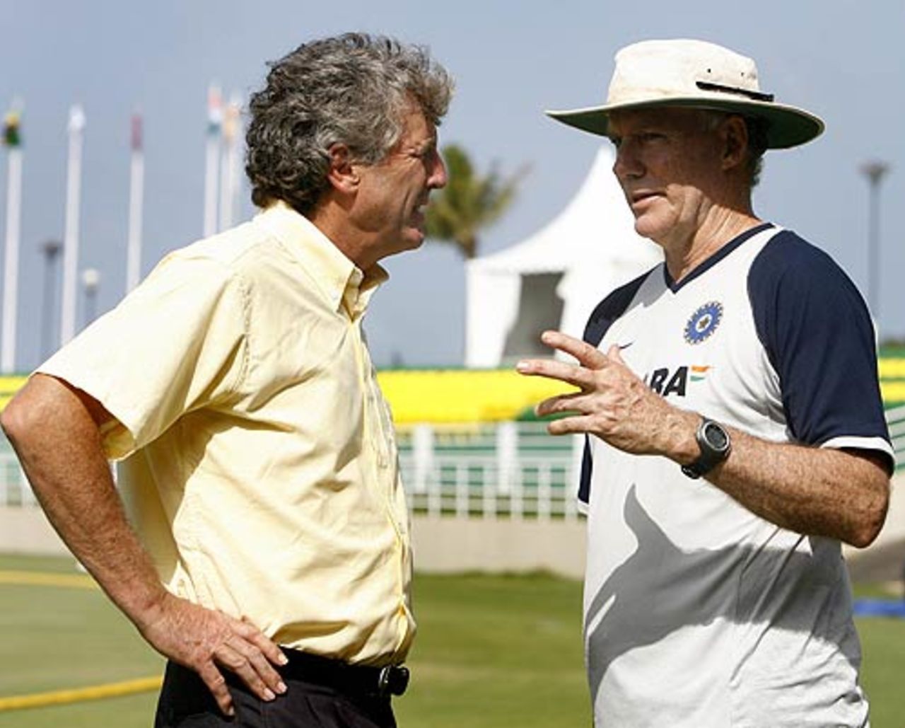 Indian coach Greg Chappell chats with former coach John Wright after their warm-up match, India v West Indies, World Cup warm up, Trelawny, Jamaica, March 9, 2007